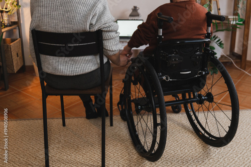 Wallpaper Mural A woman with her boyfriend with disability holding hands Torontodigital.ca