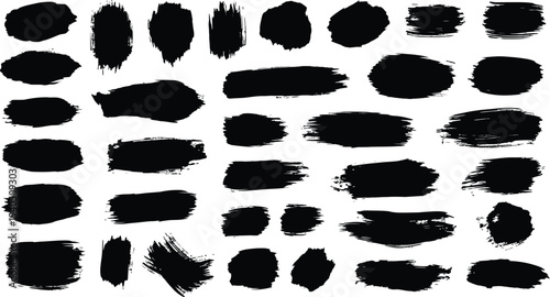 Collection of black brush strokes on white background for artistic and design purposes