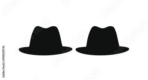 Two black fedora hats displayed against a white background silhouette