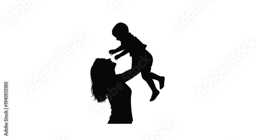 A mother playfully tosses her child up in the air silhouette
