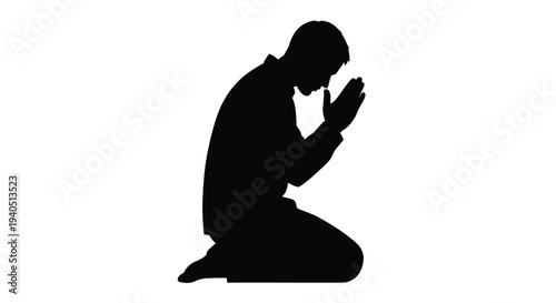 A man kneeling in prayer a striking black shape silhouette