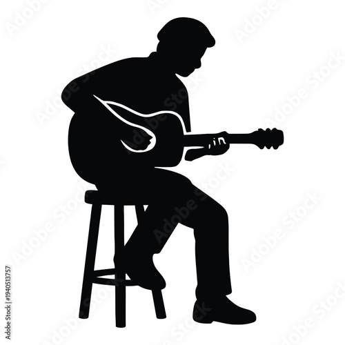 Silhouette of a man playing guitar while sitting on a stool