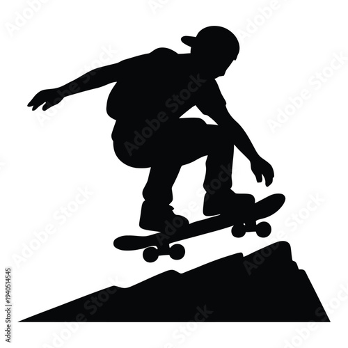 Silhouette of a Skateboarder Performing a Jump Over a Ramp
