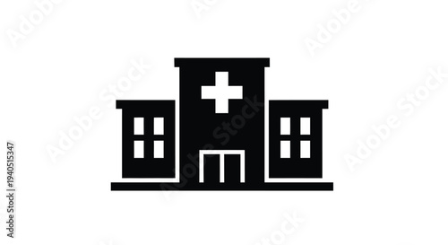 Black hospital building with a cross emblem a stark silhouette