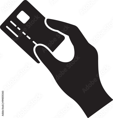 A persons hand grips a credit card showing its chip and identifying information