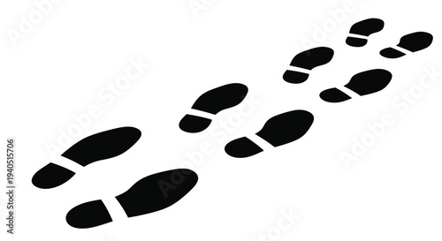 Footprints in a line create a path black and white silhouette