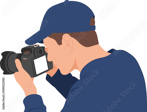 A photographer wearing a blue cap and shirt, holding a DSLR camera to capture an image, with focus on the camera and the person's profile