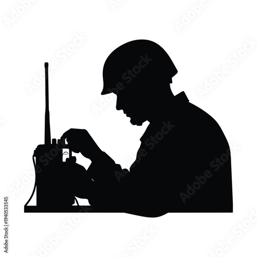 Soldier in silhouette using radio communication device