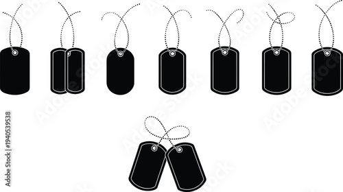 Black military dog tags with chains arranged in multiple configurations, symbolic identification gear representing service, honor, remembrance, and military tradition for stock photography use