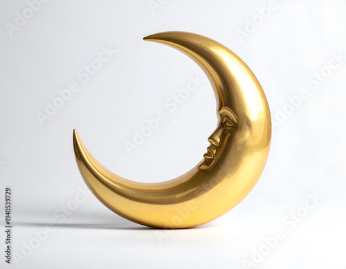 Gleaming golden crescent moon with a serene face