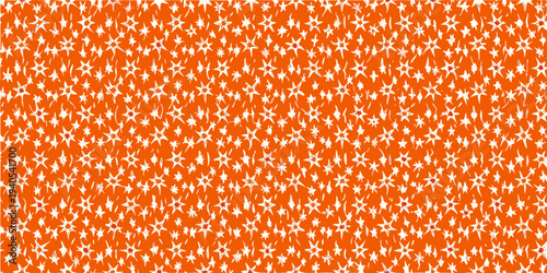 Bright orange background filled with a dense pattern of white stars