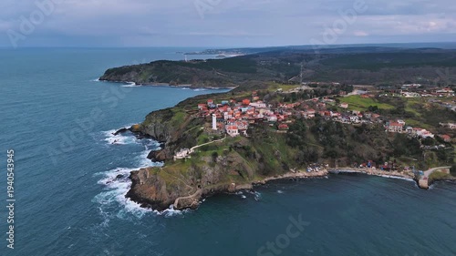 4k drone view of Anadolufeneri with its beaches, lighthouse and endless sea in Istanbul, Turkiye.