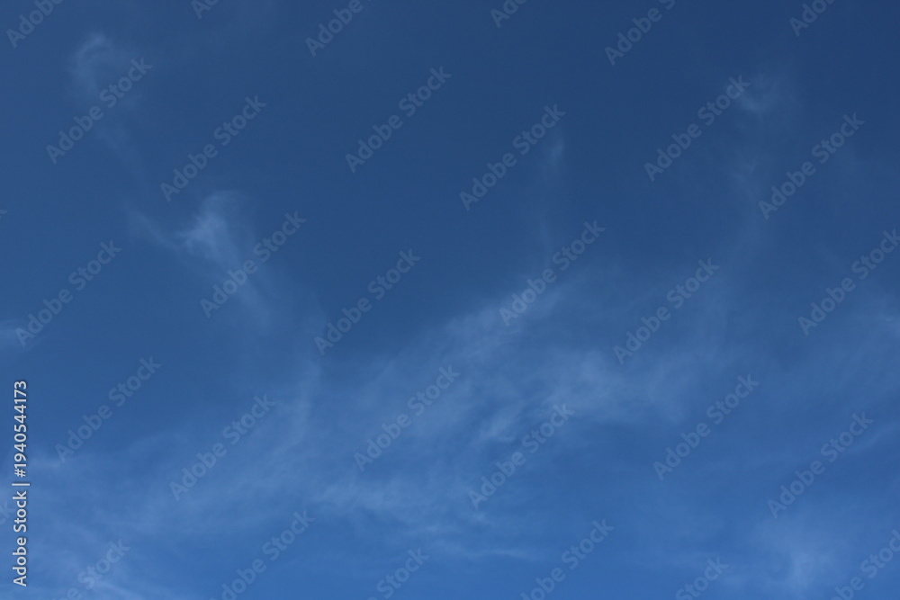 Fototapeta premium Wide View of Sky With Clouds During Daytime Over a Clear Horizon in a Rural Area