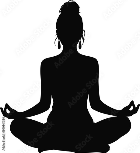 Black silhouette of a woman in a meditative yoga pose with earrings and hair tied up