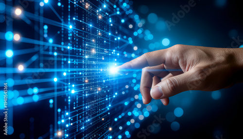 Close up of a human hand touching a glowing blue digital network interface, concept of connectivity, data interaction, and future technology.