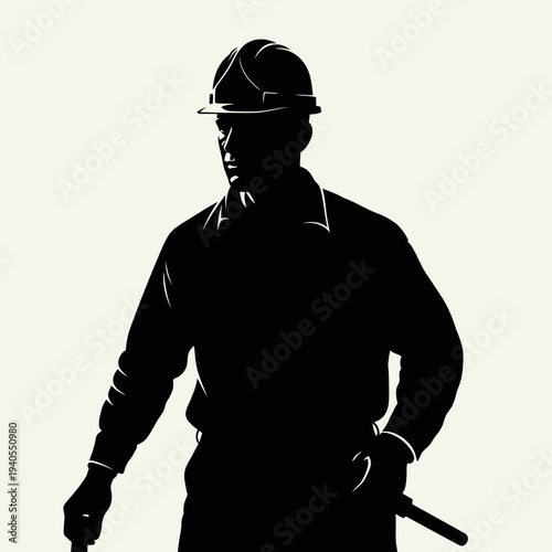 Confident construction worker in hard hat standing strong
