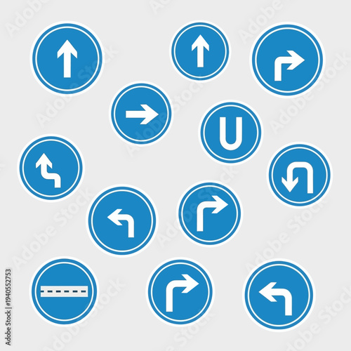 Collection of Blue Circular Road Signs with White Arrows and Symbols