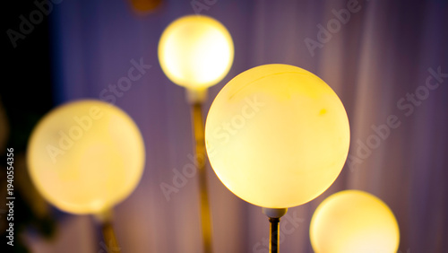Warm glowing round lamps bokeh background lampu bulat Indonesia