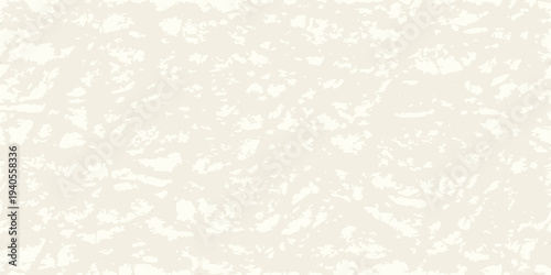 Abstract speckled pattern with a light cream and white color scheme