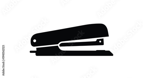Simple black silhouette of a classic office stapler