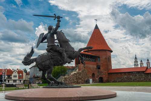 Vytis Sculpture, the Freedom Warrior - Lithuania National Symbol with Kaunas Castle on background - Kaunas, Lithuania
