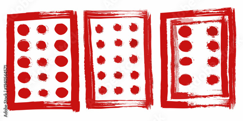 Three rectangular shapes with red and white spotted patterns