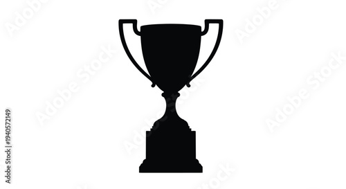 A classic gold trophy stands prominently displayed a striking silhouette