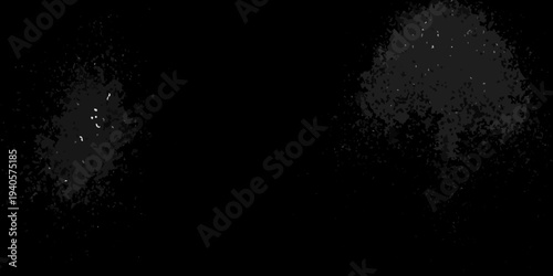 Abstract black shapes with scattered white specks against a dark background
