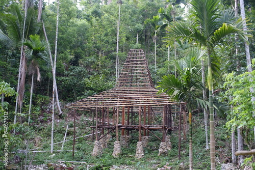 The building construction uses wooden materials for an ethnic building in the architectural style of East Nusa Tenggara.