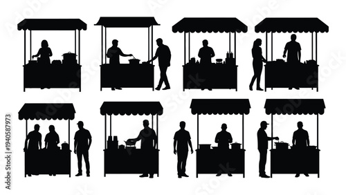 Silhouettes of people working at outdoor food stalls
