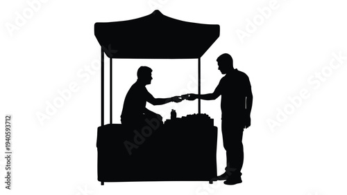 Man buying food from a vendor under a canopy