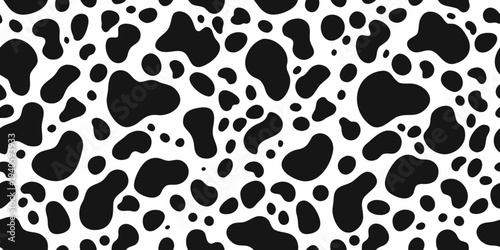 Seamless pattern of irregular black spots on a white background