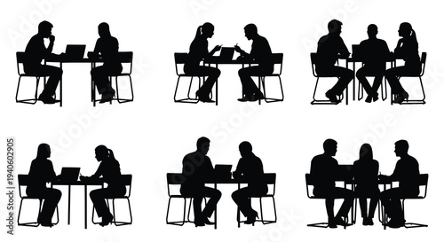 A collection of silhouetted people seated at tables engaged in discussion or working on laptops in a modern setting