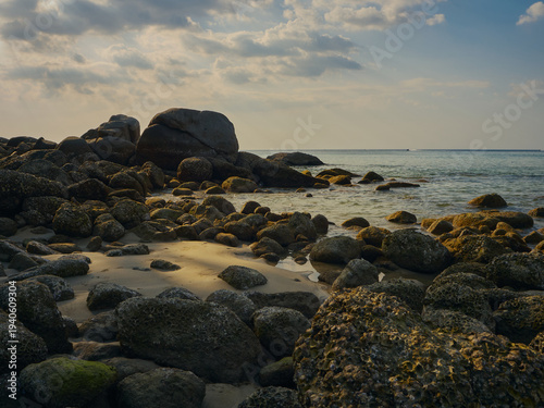 Andaman Sea, Phuket, coastline, huge rocks randomly lying on the shore, sea with gentle ripples, beautiful seascape