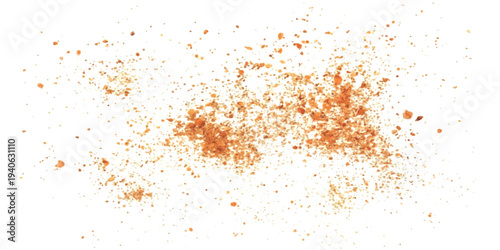 A small pile of ground paprika or chili powder scattered on a clean white background
