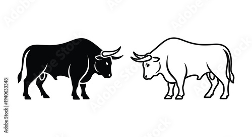 Two bulls facing each other one dark and one light in silhouette