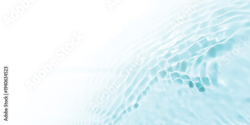 A close-up view of gentle water ripples creating a soothing pattern against a bright white background