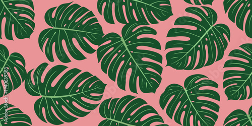 Tropical monstera leaves pattern against a solid pink background