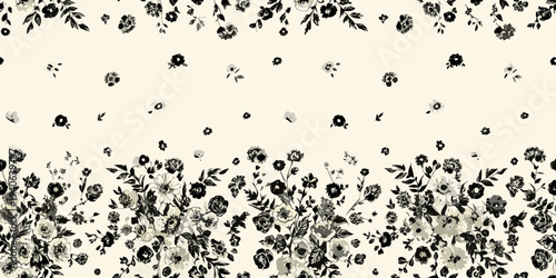 Delicate black floral pattern scattered across a cream colored background