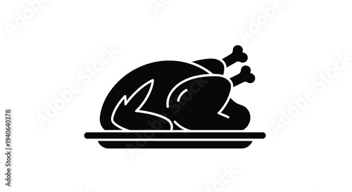 A black silhouette of a roasted turkey presented on a platter