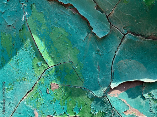 A wall with a green and brown paint job