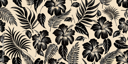 Elegant black tropical foliage and hibiscus flowers on a beige background