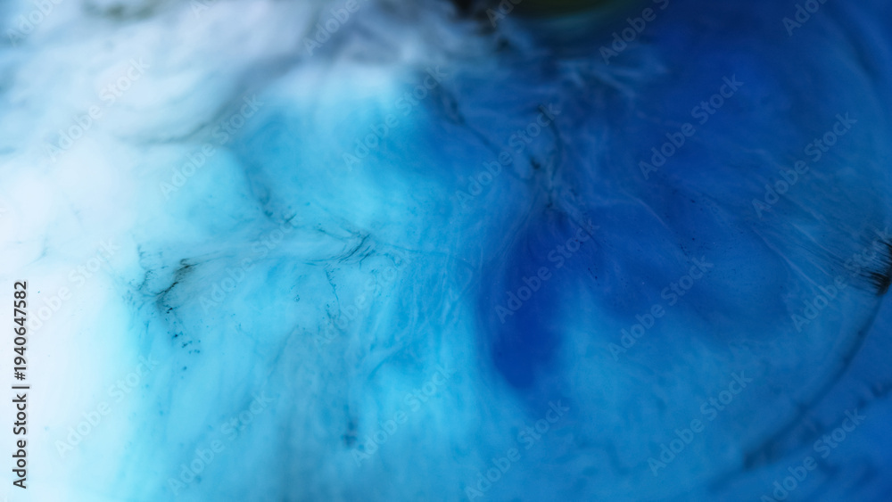 Fototapeta premium Defocused acrylic paint. Blue spill texture. Vivid water color liquid spatter marble mix spreading on abstract art background.