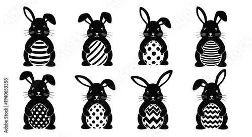 Eight decorative black-and-white patterned Easter bunnies.