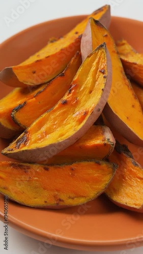 Roasted Sweet Potato Wedges on Ceramic Plate