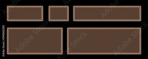 Five glowing brown rectangle and square frames with illuminated borders on a dark empty stage