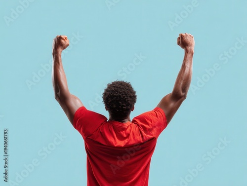 victory pose athlete arms raised isolated on a light blue background