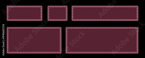 Various blank retro marquee light frames in different sizes glow with pink illumination on a dark background