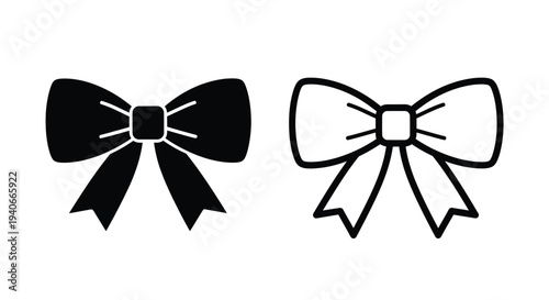 Two decorative bows in contrasting black and white designs