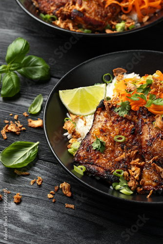 Lemongrass chicken thigh with carrot pickles, rice and fried onion